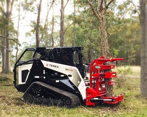 brown tree cutter for skid steer|skid steer tree cutting attachment.